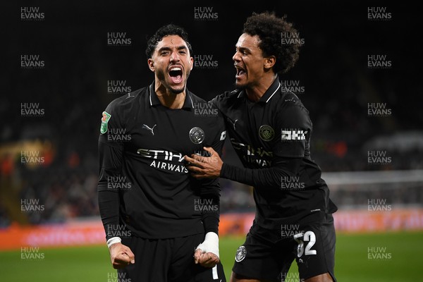291025 - Swansea City v Manchester City - Carabao Cup Round 4 - Omar Marmoush of Manchester City celebrates scoring a goal with Oscar Bobb of Manchester City