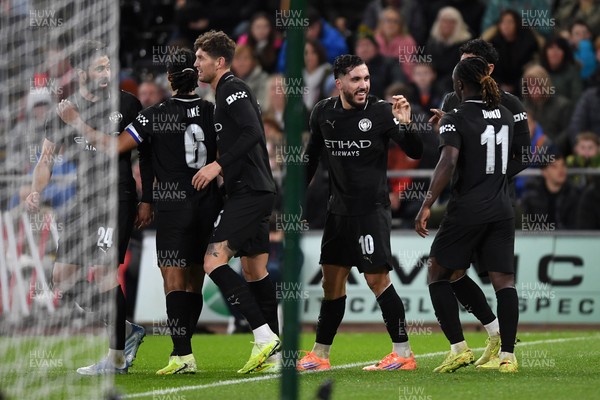 291025 - Swansea City v Manchester City - Carabao Cup Round 4 - Rayan Cherki of Manchester City celebrates scoring a goal with team mates