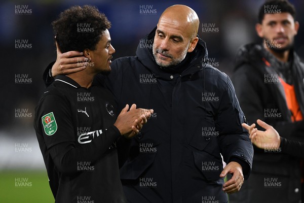 291025 - Swansea City v Manchester City - Carabao Cup Round 4 - Pep Guardiola, Manchester City Manager with Oscar Bobb of Manchester City at full time