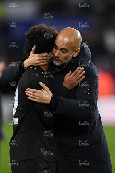 291025 - Swansea City v Manchester City - Carabao Cup Round 4 - Pep Guardiola, Manchester City Manager with Oscar Bobb of Manchester City at full time