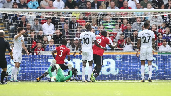 190817 - Swansea City v Manchester United, Premier League - Eric Bailly of Manchester United fires the ball home to score goal
