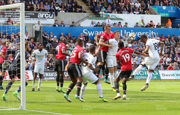 190817 - Swansea City v Manchester United, Premier League - Jordan Ayew of Swansea City just fails to head the ball at goal as the ball is crossed in