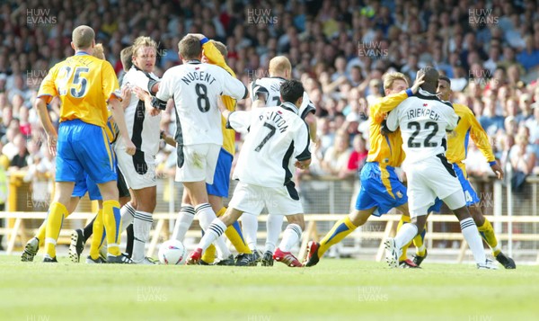 300803 - Swansea City v Mansfield Town - Third Division - Fighting breaks out after Mansfield's Lee Williamson kicks out at Leon Britton