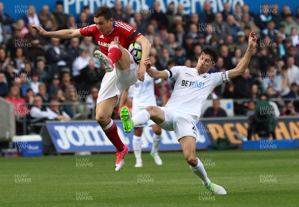 020417 - Swansea City v Middlesbrough, Premier League - Jack Cork of Swansea City and Stewart Downing of Middlesbrough compete for the ball