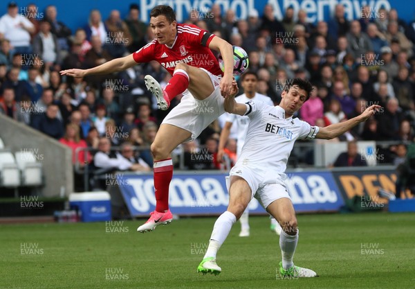 020417 - Swansea City v Middlesbrough, Premier League - Jack Cork of Swansea City and Stewart Downing of Middlesbrough compete for the ball