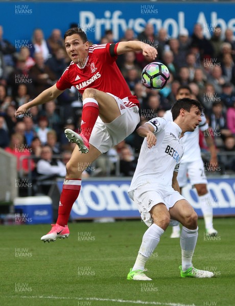 020417 - Swansea City v Middlesbrough, Premier League - Jack Cork of Swansea City and Stewart Downing of Middlesbrough compete for the ball