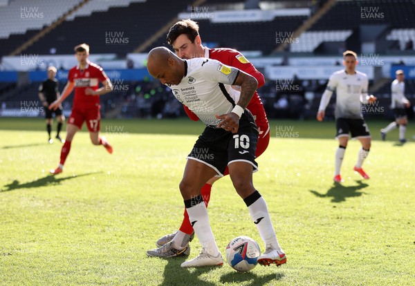 060321 - Swansea City v Middlesbrough - SkyBet Championship - Andre Ayew of Swansea City is challenged by Grant Hall of Middlesbrough
