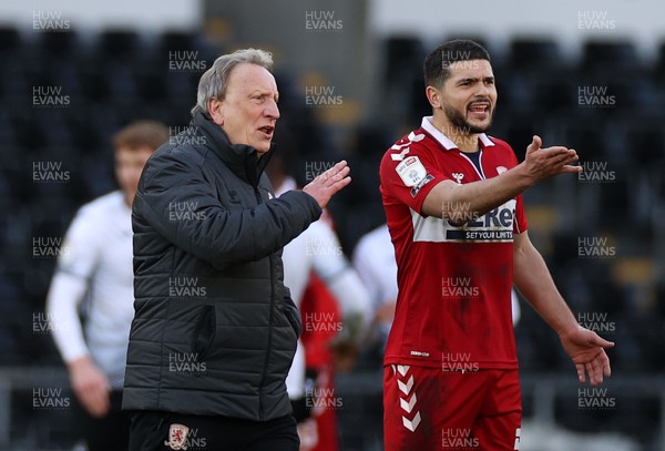 060321 - Swansea City v Middlesbrough - SkyBet Championship - Middlesbrough Manager Neil Warnock and Sam Morsy talk to referee at full time