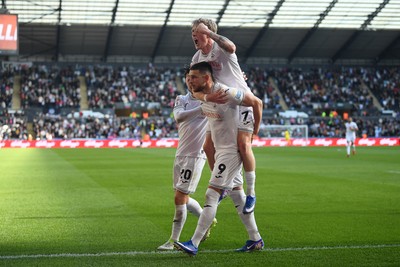 060426 - Swansea City v Middlesbrough - Sky Bet Championship - Zan Vipotnik of Swansea City celebrates scoring a goal with Melker Widell to equalise the game