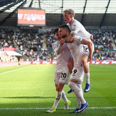 060426 - Swansea City v Middlesbrough - Sky Bet Championship - Zan Vipotnik of Swansea City celebrates scoring a goal with Melker Widell to equalise the game