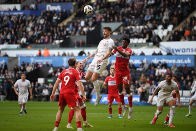 060426 - Swansea City v Middlesbrough - Sky Bet Championship - Cameron Burgess of Swansea City heads the ball