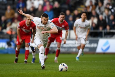 060426 - Swansea City v Middlesbrough - Sky Bet Championship - Zan Vipotnik of Swansea City scores from the penalty spot