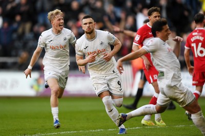 060426 - Swansea City v Middlesbrough - Sky Bet Championship - Zan Vipotnik of Swansea City scores from the penalty spot