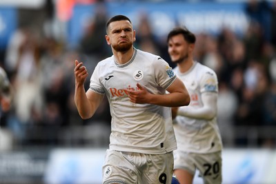 060426 - Swansea City v Middlesbrough - Sky Bet Championship - Zan Vipotnik of Swansea City celebrates scoring his second goal from the penalty spot