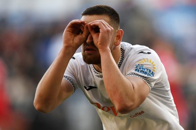 060426 - Swansea City v Middlesbrough - Sky Bet Championship - Zan Vipotnik of Swansea City celebrates scoring his second goal from the penalty spot