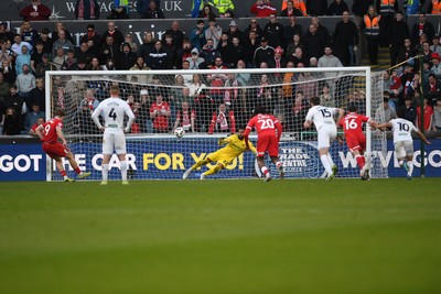 060426 - Swansea City v Middlesbrough - Sky Bet Championship - Tommy Conway of Middlesbrough scores from the penalty spot to equalise the game
