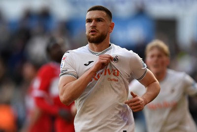 060426 - Swansea City v Middlesbrough - Sky Bet Championship - Zan Vipotnik of Swansea City scores from the penalty spot to equalise the game