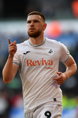 060426 - Swansea City v Middlesbrough - Sky Bet Championship - Zan Vipotnik of Swansea City scores from the penalty spot to equalise the game