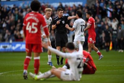 060426 - Swansea City v Middlesbrough - Sky Bet Championship - Liam Cullen of Swansea City is taken out by Alex Bangura of Middlesbrough to earn his side a penalty