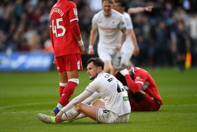 060426 - Swansea City v Middlesbrough - Sky Bet Championship - Liam Cullen of Swansea City is taken out by Alex Bangura of Middlesbrough to earn his side a penalty