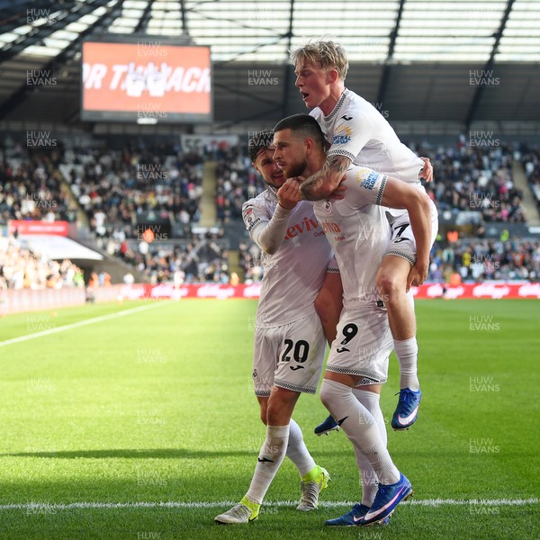 060426 - Swansea City v Middlesbrough - Sky Bet Championship - Zan Vipotnik of Swansea City celebrates scoring a goal with Melker Widell to equalise the game