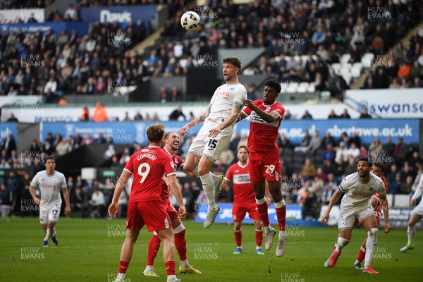 060426 - Swansea City v Middlesbrough - Sky Bet Championship - Cameron Burgess of Swansea City heads the ball