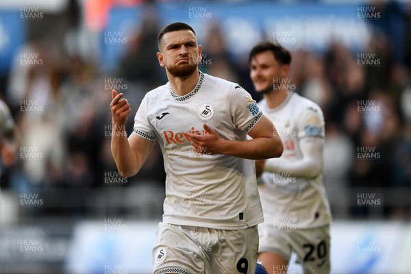060426 - Swansea City v Middlesbrough - Sky Bet Championship - Zan Vipotnik of Swansea City celebrates scoring his second goal from the penalty spot