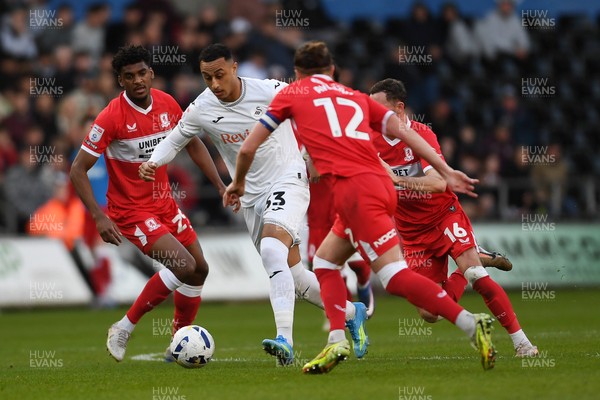 060426 - Swansea City v Middlesbrough - Sky Bet Championship - Adam Idah of Swansea City is challenged by Luke Ayling of Middlesbrough