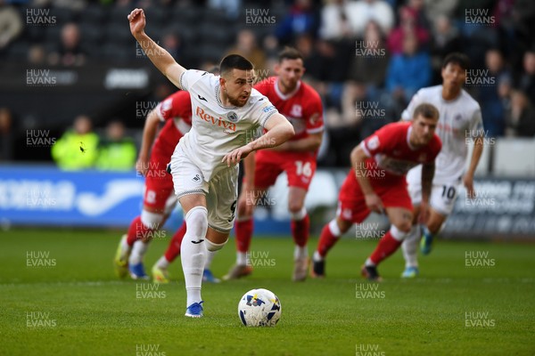 060426 - Swansea City v Middlesbrough - Sky Bet Championship - Zan Vipotnik of Swansea City scores from the penalty spot to equalise the game