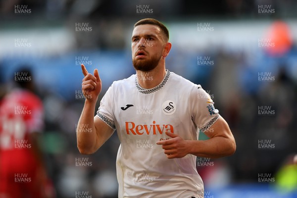060426 - Swansea City v Middlesbrough - Sky Bet Championship - Zan Vipotnik of Swansea City scores from the penalty spot to equalise the game