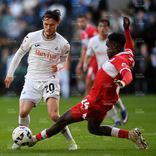 060426 - Swansea City v Middlesbrough - Sky Bet Championship - Liam Cullen of Swansea City is taken out by Alex Bangura of Middlesbrough to earn his side a penalty