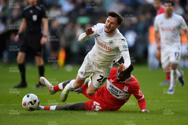 060426 - Swansea City v Middlesbrough - Sky Bet Championship - Liam Cullen of Swansea City is taken out by Alex Bangura of Middlesbrough to earn his side a penalty