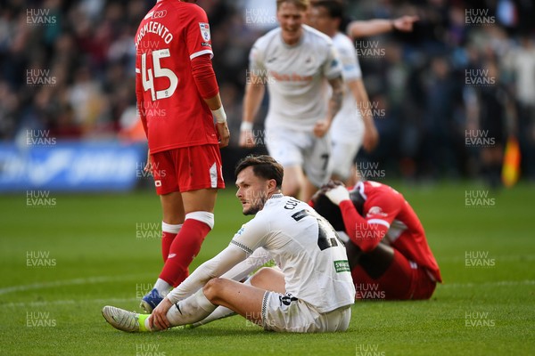 060426 - Swansea City v Middlesbrough - Sky Bet Championship - Liam Cullen of Swansea City is taken out by Alex Bangura of Middlesbrough to earn his side a penalty