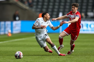 080325 - Swansea City v Middlesbrough - Sky Bet Championship - Hayden Hackney of Middlesborough brings down Ronald Pereira Martin of Swansea City