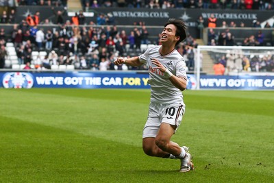 080325 - Swansea City v Middlesbrough - Sky Bet Championship - Ji-Sung Eom of Swansea City celebrates after scoring a goal