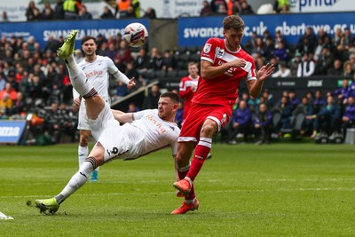 080325 - Swansea City v Middlesbrough - Sky Bet Championship - Zan Vipotnik of Swansea City shoots at goal