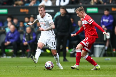 080325 - Swansea City v Middlesbrough - Sky Bet Championship - Josh Tymon of Swansea City passes the ball