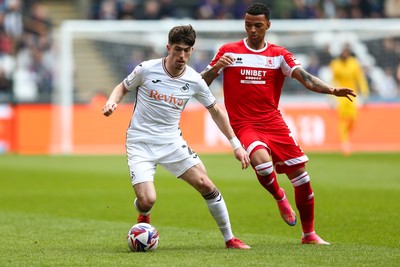 080325 - Swansea City v Middlesbrough - Sky Bet Championship - Josh Key of Swansea City is challenged by Hayden Hackney of Middlesborough