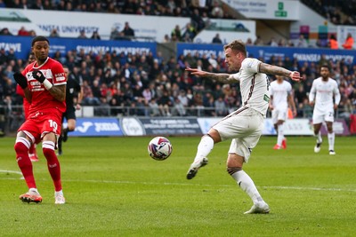 080325 - Swansea City v Middlesbrough - Sky Bet Championship - Josh Tymon of Swansea City shoots at goal