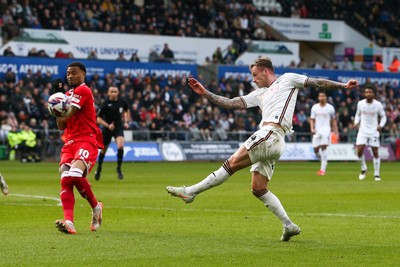 080325 - Swansea City v Middlesbrough - Sky Bet Championship - Josh Tymon of Swansea City shoots at goal