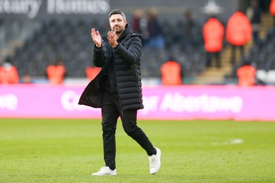 080325 - Swansea City v Middlesbrough - Sky Bet Championship - Swansea City interim manager Alan Sheehan applauds the fans at the end of the game