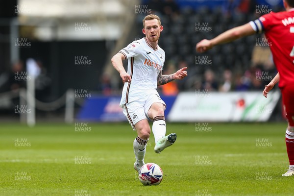 080325 - Swansea City v Middlesbrough - Sky Bet Championship - Lewis O'Brien of Swansea City passes the ball