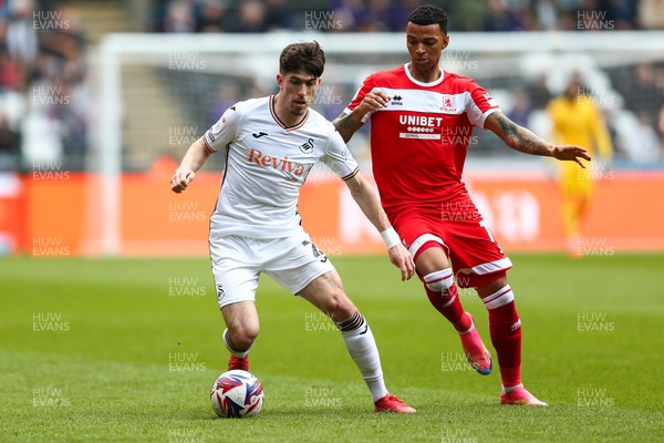 080325 - Swansea City v Middlesbrough - Sky Bet Championship - Josh Key of Swansea City is challenged by Hayden Hackney of Middlesborough