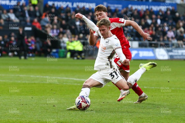 080325 - Swansea City v Middlesbrough - Sky Bet Championship - Ollie Cooper of Swansea City shoots at goal