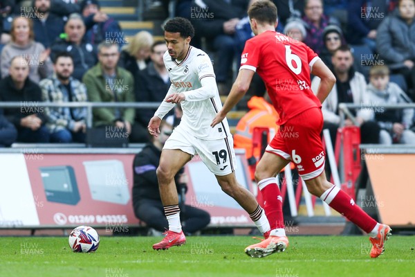 080325 - Swansea City v Middlesbrough - Sky Bet Championship - Florian Bianchini of Swansea City takes on Dael Fry of Middlesborough