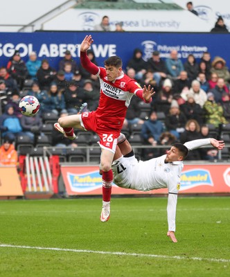 110323 - Swansea City v Middlesbrough, EFL Sky Bet Championship - Joel Piroe of Swansea City tries a spectacular shot at goal as Darragh Lenihan of Middlesbrough challenges