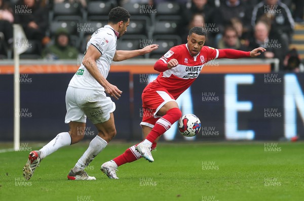 110323 - Swansea City v Middlesbrough, EFL Sky Bet Championship - Ben Cabango of Swansea City and Cameron Archer of Middlesbrough compete for the ball