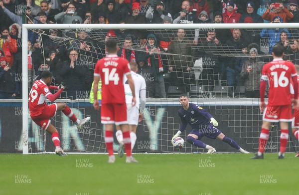 110323 - Swansea City v Middlesbrough, EFL Sky Bet Championship - Chuba Akpom of Middlesbrough scores the third goal as he puts a penalty past Swansea City goalkeeper Andy Fisher