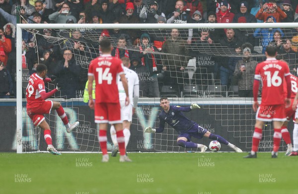 110323 - Swansea City v Middlesbrough, EFL Sky Bet Championship - Chuba Akpom of Middlesbrough scores the third goal as he puts a penalty past Swansea City goalkeeper Andy Fisher