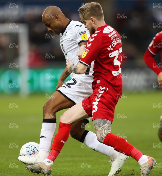 141219 - Swansea City v Middlesbrough, Sky Bet Championship - Andre Ayew of Swansea City holds off Hayden Coulson of Middlesbrough